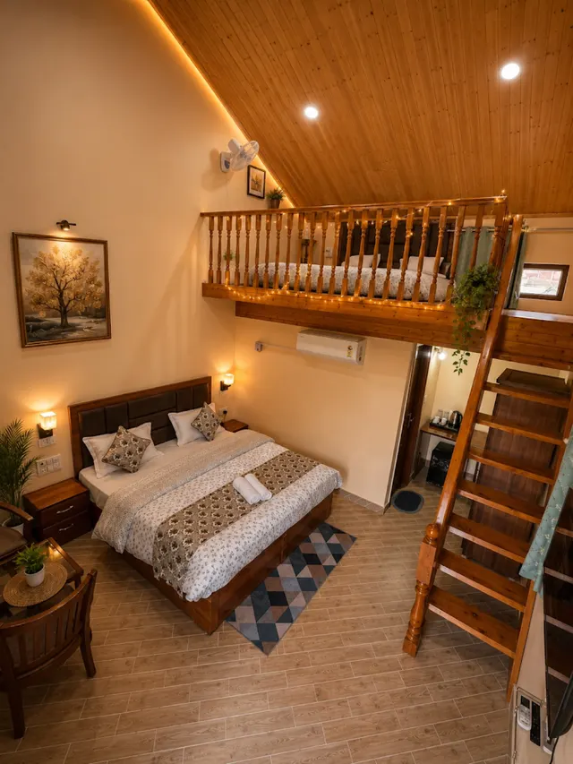 Family duplex with a loft and wooden stairs