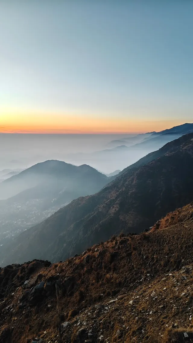 Misty Dhauladhar ridges at sunrise
