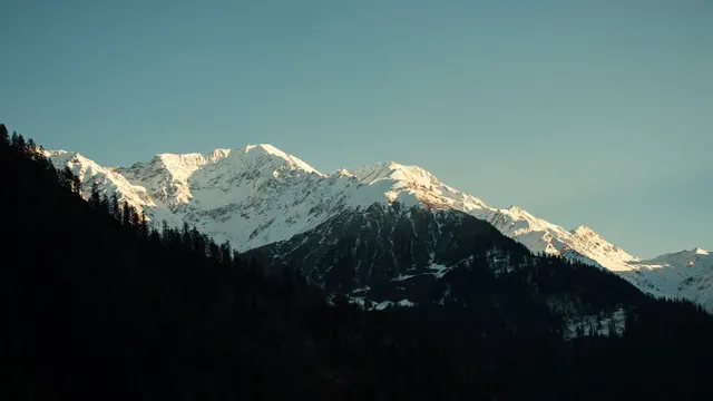 Sunrise over snow-capped peaks, Parvati Valley